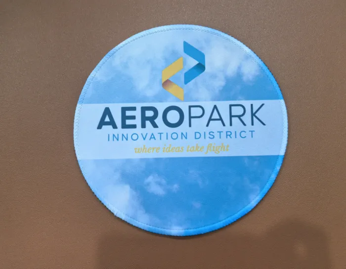 CustomBannersNow.Com - Custom Round Mouse Pad