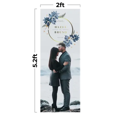 A couple embraces on a beach, featured on an advertisement with floral graphics and text 'HAZEL & BRUNO, SAVE THE DATE, 09.26.2022'.
